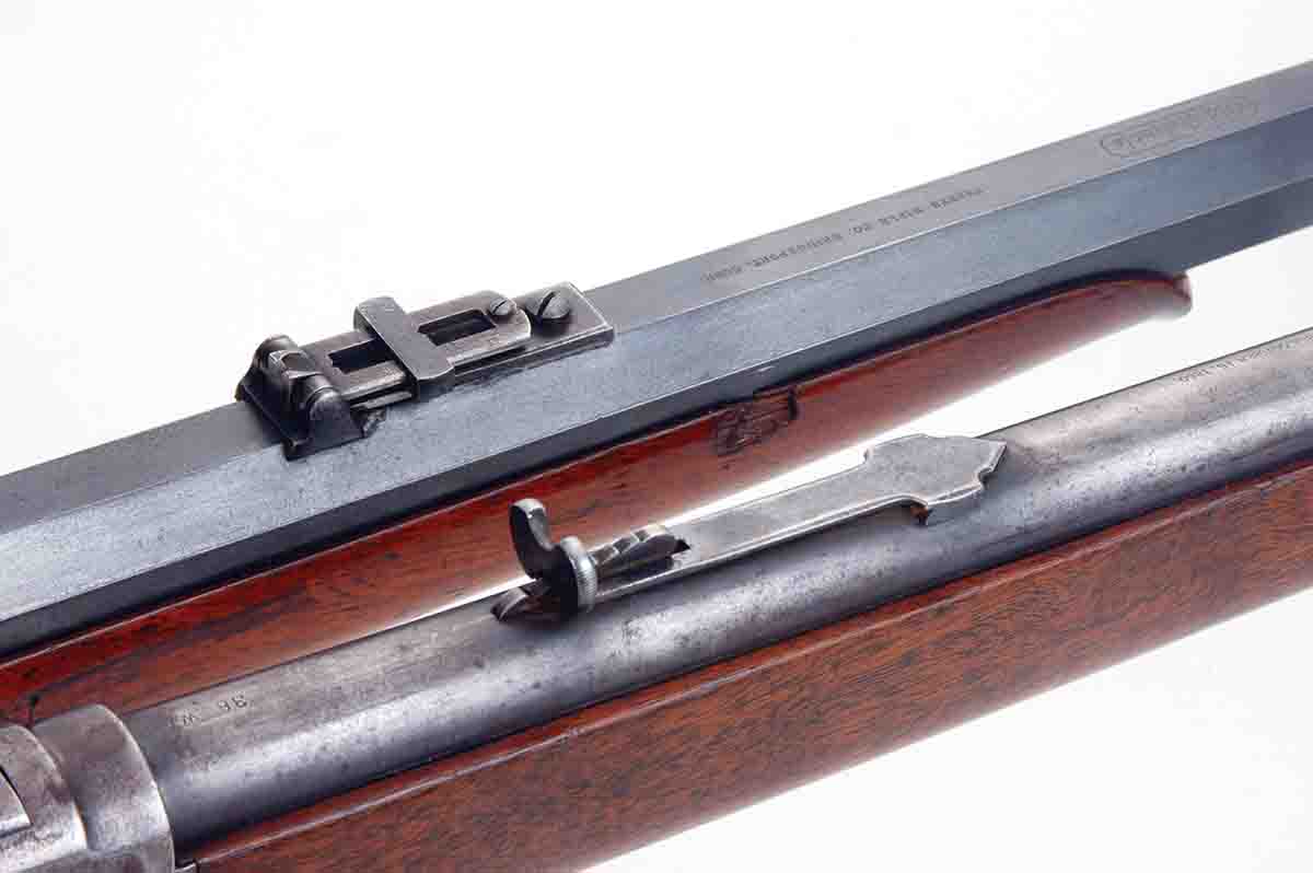 Virtually all vintage sporting rifles were shipped with open rear sights. At top is a ladder style on an original Sharps Model 1874, and below it is a buckhorn style with notched slider on a Winchester Model 1873.